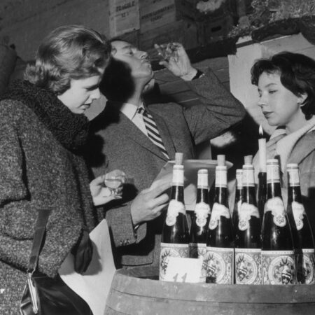 Vintage photo of couples drinking wine